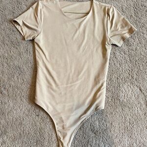 Charlotte Russe Woman’s Cream Bodysuit